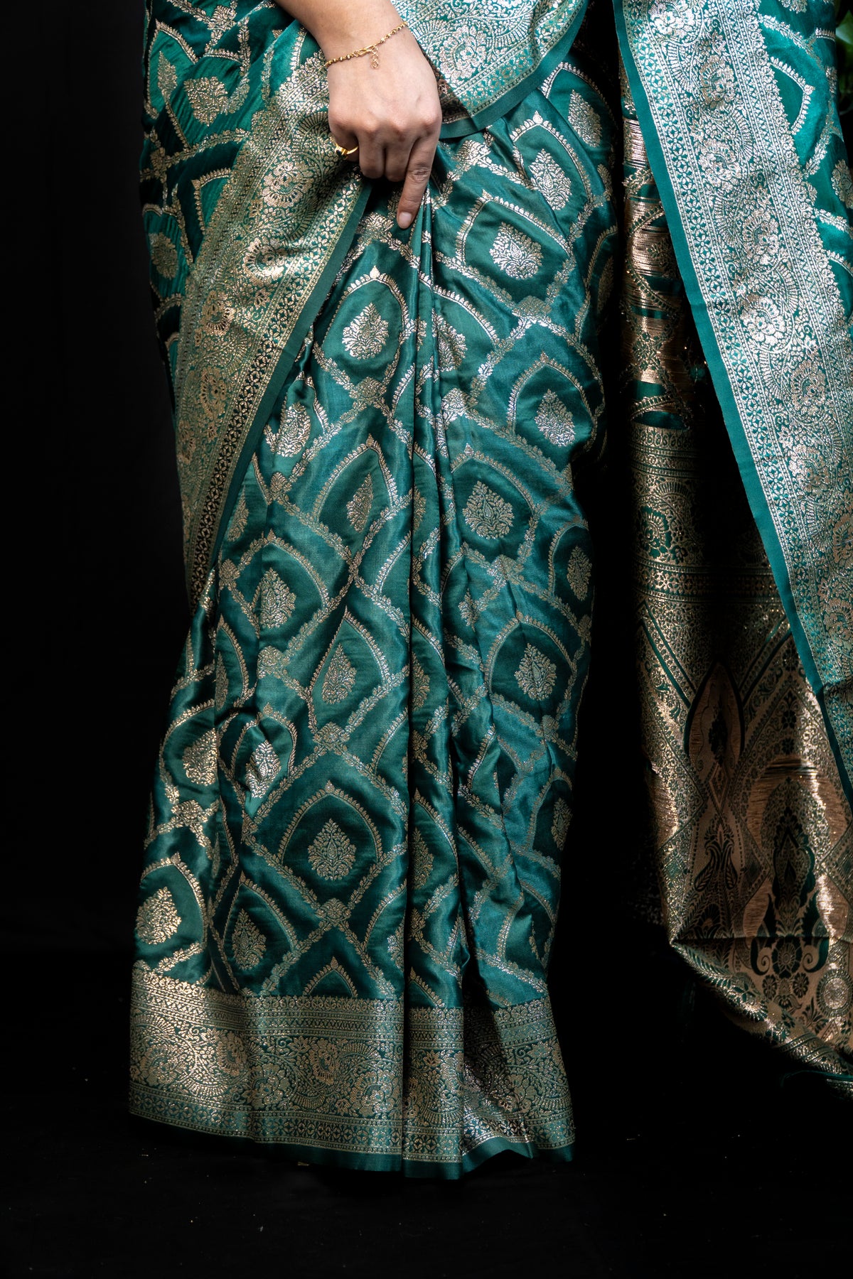Intricate Zari Woven satin Silk Saree with Rich Gold Brocade Border