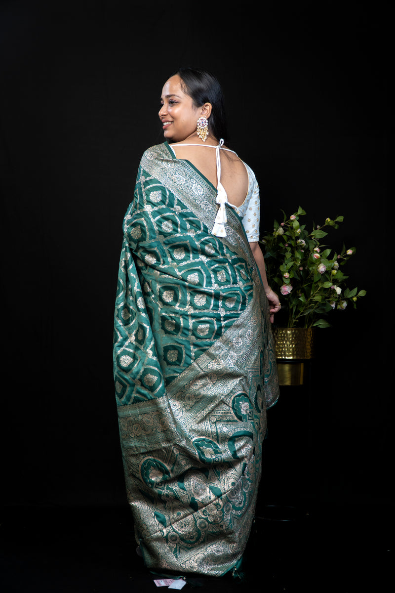 Intricate Zari Woven satin Silk Saree with Rich Gold Brocade Border