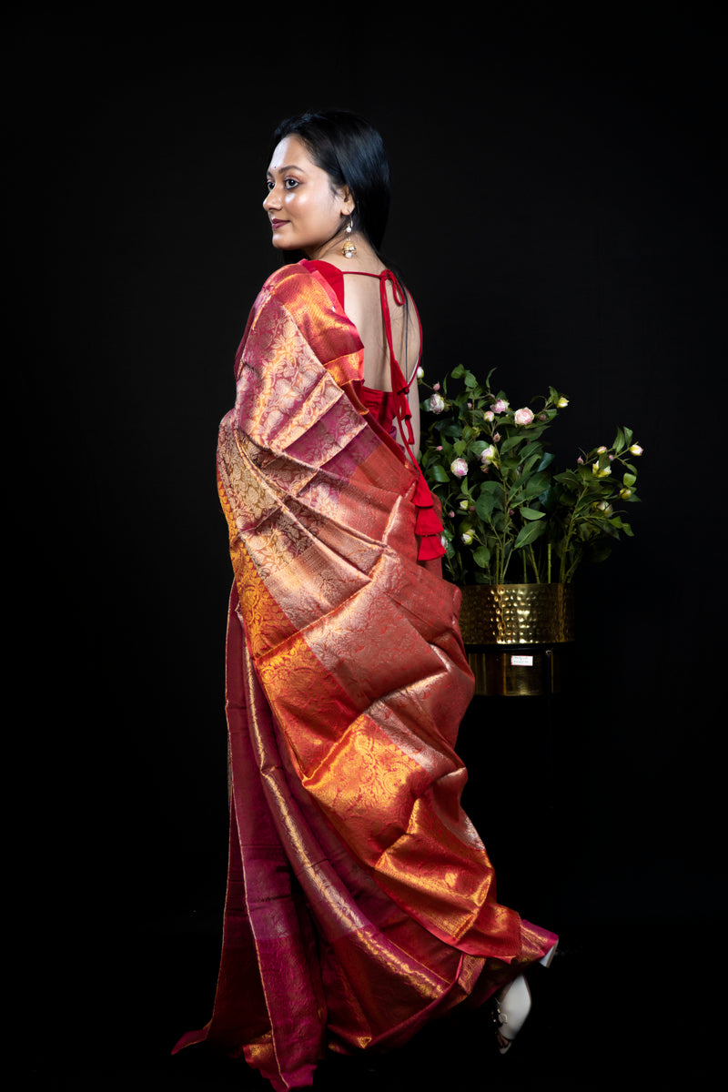 Semi tissue kanjiivaram Silk Saree with golden zari all over body.