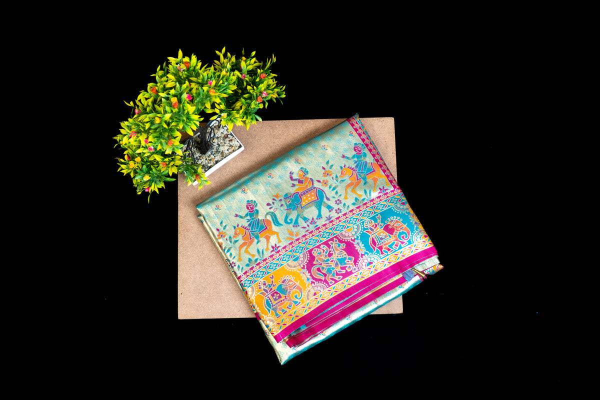 Tissue Silk Baluchari Saree with Multicolour Pictorial Border & Contrast Border