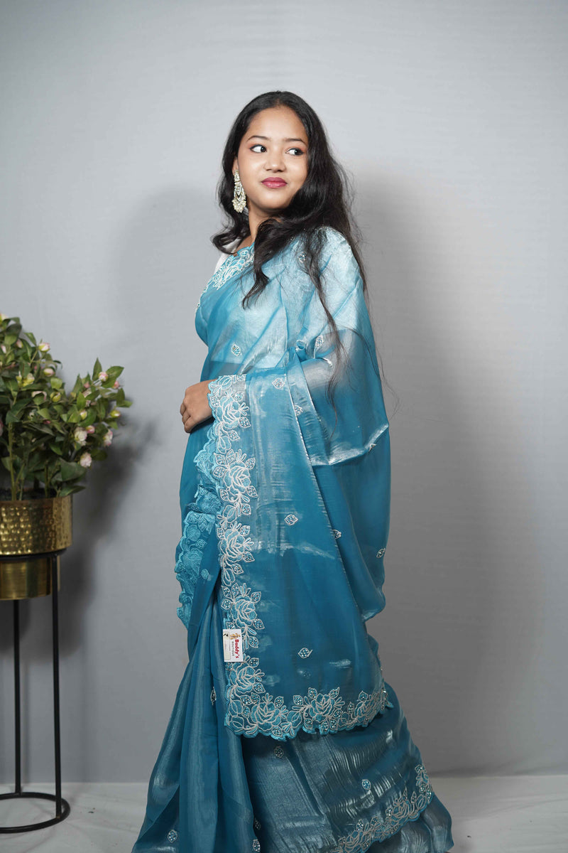 Teal Blue Jimmy Choo Saree with Scalloped Floral Cutwork Border & stone Work