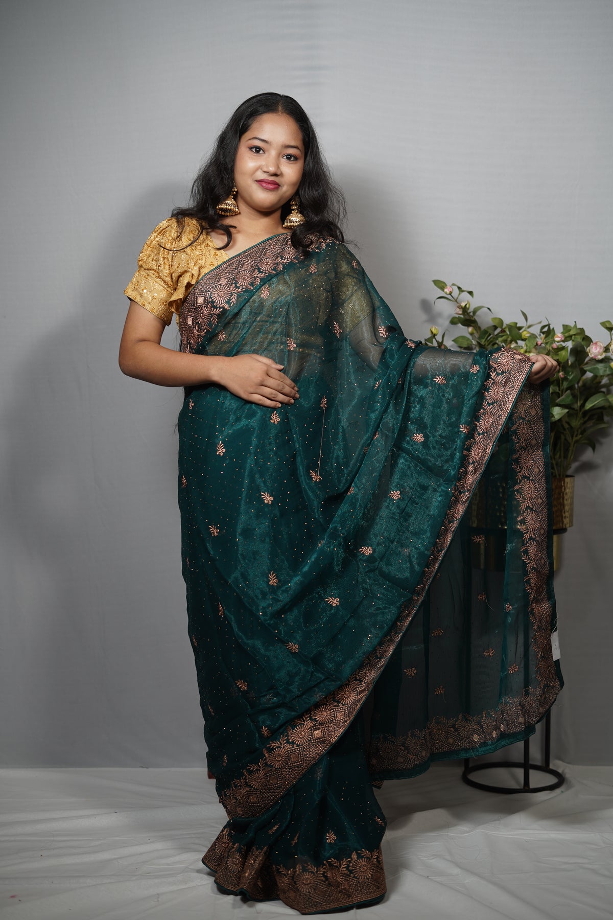 Premium Georgette Saree with Delicate Woven Butis & Elaborate Embroidered Border