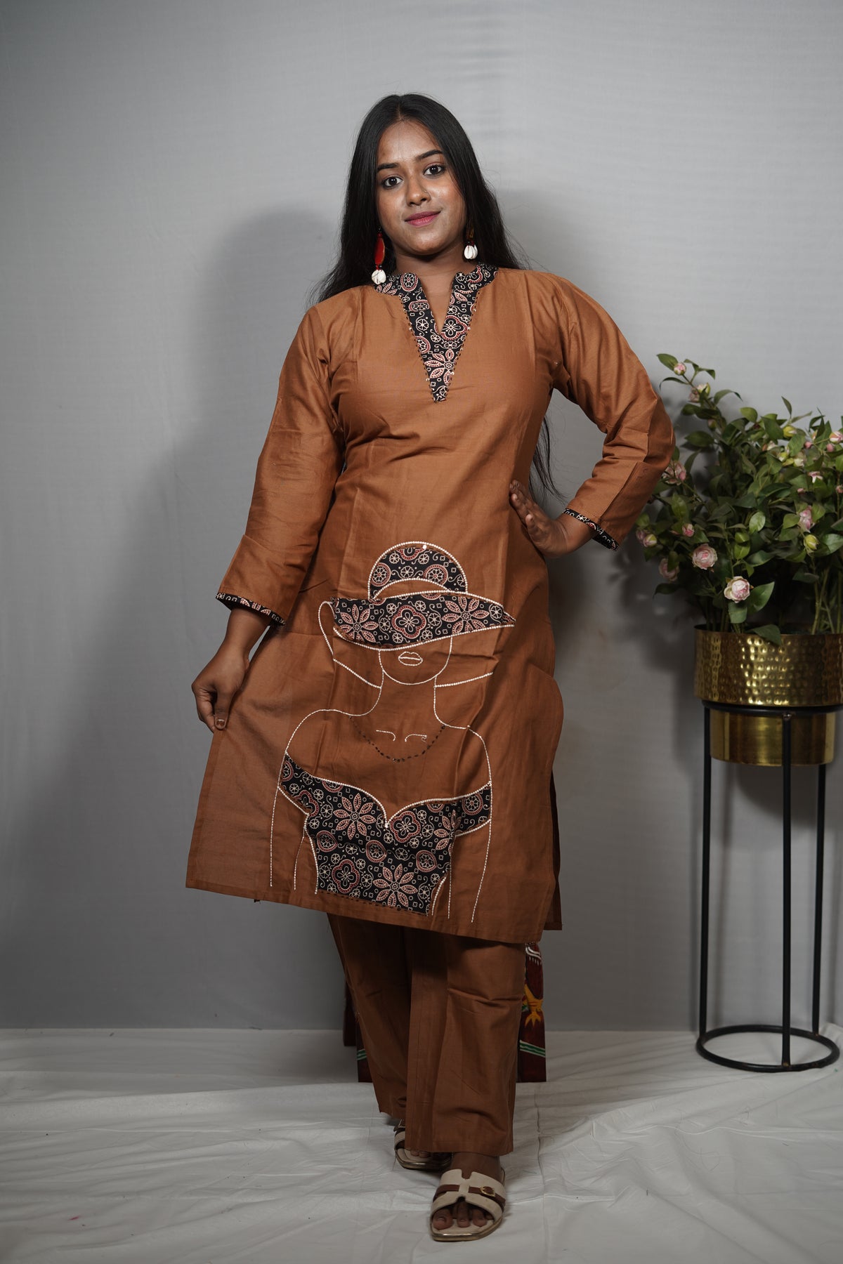 Rust Brown Cotton Kurta with Ajrakh-Print Lady-Figure Applique & Pearl Embroidery
