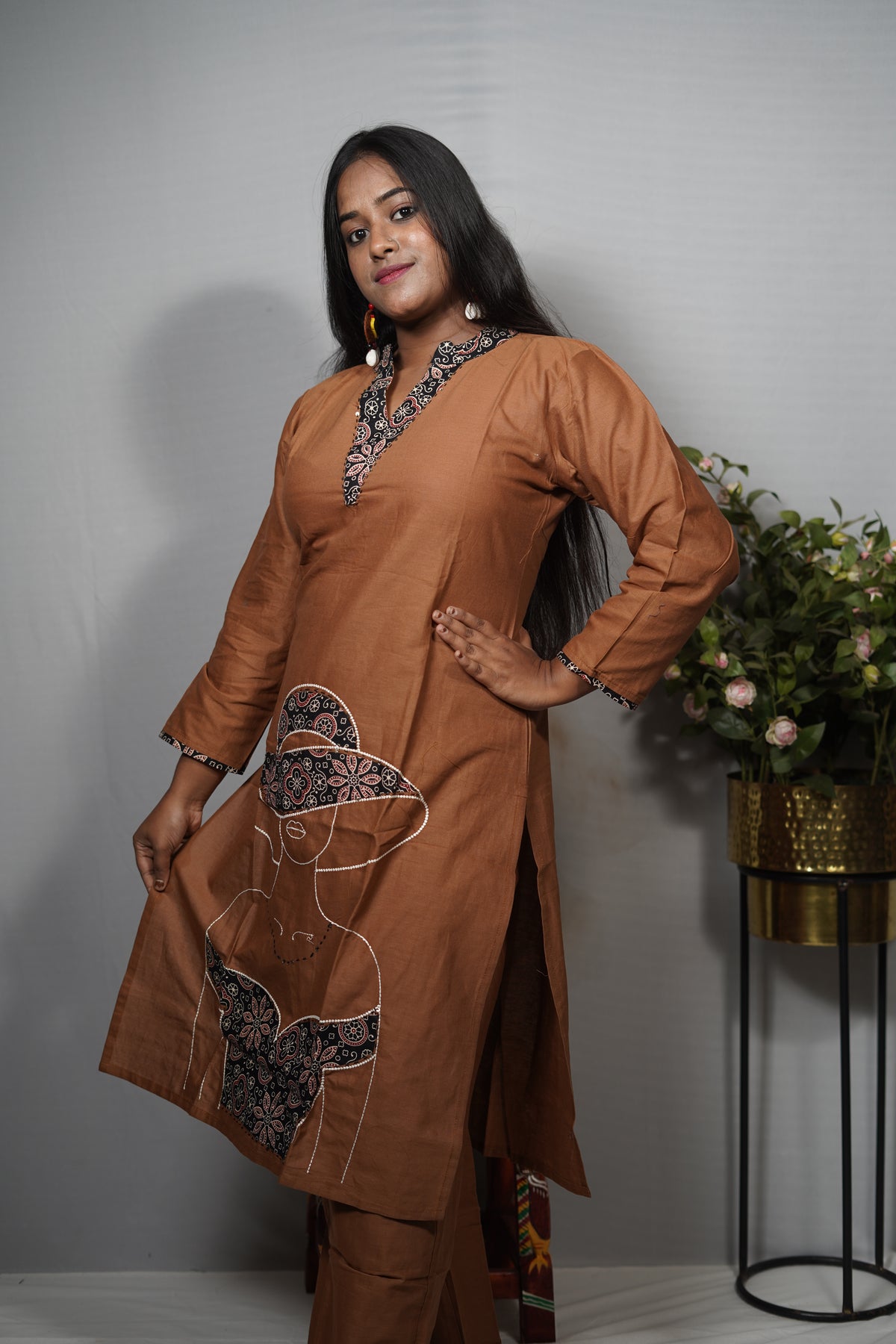 Rust Brown Cotton Kurta with Ajrakh-Print Lady-Figure Applique & Pearl Embroidery